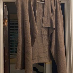 A brown sweater vest